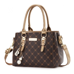 Fashionable brown monogram handbag with gold handles and decorative pearl charm