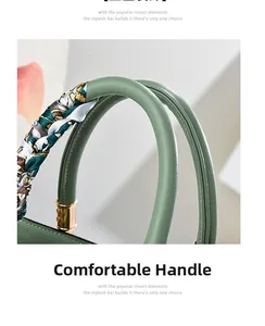 Macro detail of green lychee leather handbag with silk scarf and gold hardware