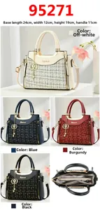 Detailed view of woven pattern handbag dimensions 24x12x19cm and internal compartments