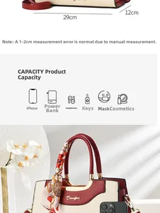 Detail showing 29cm length size and large capacity of this elegant embroidered handbag