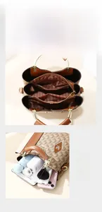 Detail view of large capacity multi-compartment brown tote bag showing internal storage space