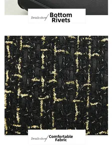 Detail showing black tweed fabric with gold threads and protective bottom metal rivets