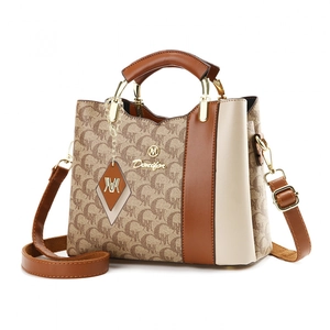 Chic beige and brown crossbody bag with letter pattern and top handle for daily use
