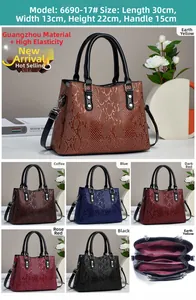 Detailansicht der großen Handtasche mit Prägung und Maßen 30x13x22cm für den Alltag