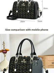 Detailed view of tweed Boston bag dimensions 25x18x11cm with smartphone size comparison