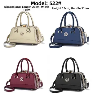 Glossy evening handbags in four colors showing size 23x13x13cm and metal jewel clasps