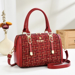 Elegant red tweed boston bag for women with gold hardware and top handle strap