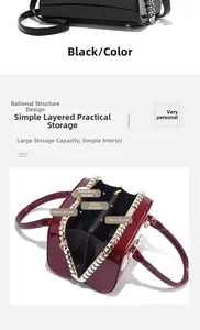 Detail view of glossy patent leather evening bag with internal compartments and hardware