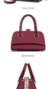 Detail view of burgundy patent leather handbag with side, back, and diamond clasp close-up