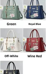 Fünf elegante Handtaschen mit Lotusemstickerei und Herzquasten in verschiedenen Farben