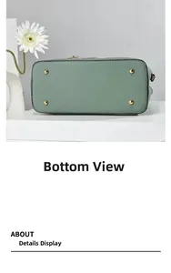 Detailansicht der Unterseite einer mintgrünen Handtasche mit vier goldenen Metallfüßen