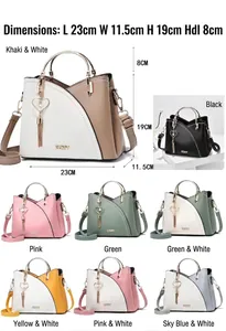 Detailed view of color-block tote bag with dimensions and heart tassel charm