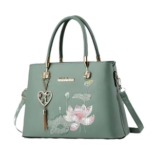 Elegante grüne Handtasche mit Lotus-Stickerei, Tragegriffen und goldenen Details
