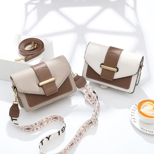 Minimalist square crossbody bags in beige and white with wide embroidered shoulder straps