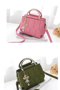 Detail of pink and green handbags featuring hexagonal stitching and metal handles