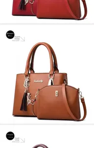 Ensemble sac cabas et sac bandoulière marron avec pompon chat vu de côté en détail