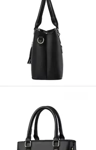Vue détaillée du grand sac cabas noir mat avec anneau en D et poignées renforcées
