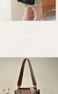 Detail of minimalist black underarm bag and brown shoulder bag with woven strap