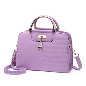 Lavender embossed PU leather handbag with golden deer charm and circular metal handles
