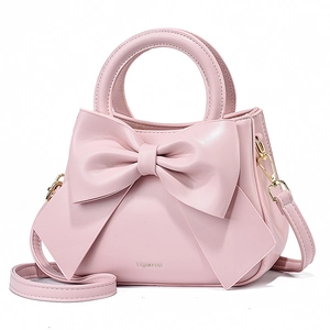Sac à main rose pour femme avec grand nœud élégant et bandoulière amovible chic