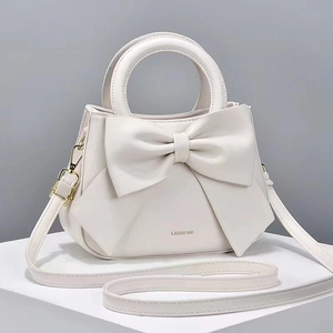 Sac à Main Élégant en Cuir PU avec Nœud Papillon pour Femme Mode Coquille Bandoulière Accents Dorés Bandoulière Amovible Quotidien