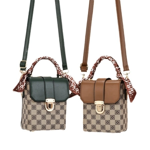 Retro mini crossbody bags in green and brown checkerboard floral pattern with silk handle