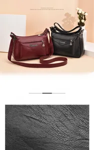 Detailed macro view of soft leather texture and zipper compartments on crossbody bags
