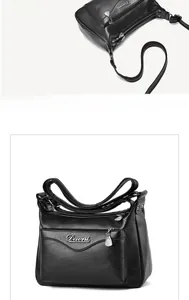 Detail view of black soft leather crossbody bag featuring Davni metal logo and zip pockets