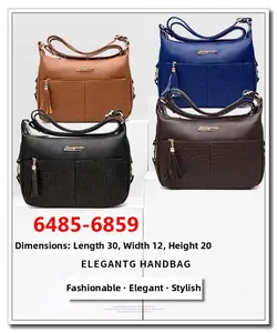 Detailed view showing elegant crocodile texture, tassels, and dimensions 30x12x20cm for the bag