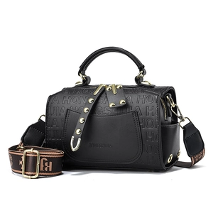 Minimalist black leather handbag with embossed letters and patterned wide shoulder strap