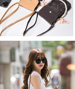 Detail of crossbody phone bag with vintage patterns, pearl handle and bear charm strap