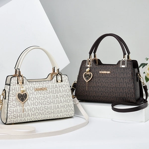 Large capacity monogram commuter handbags for women in cream and dark brown tones