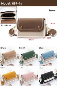 Detail view of the interior dual-layer structure and dimensions of the crossbody bag