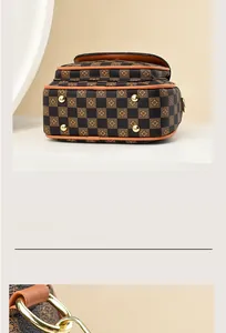 Detail of checkered women's handbag featuring golden bottom studs and D-ring hardware