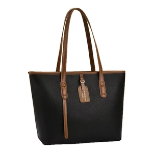 Minimalist black and brown leather tote bag with gold hardware for office and daily commute