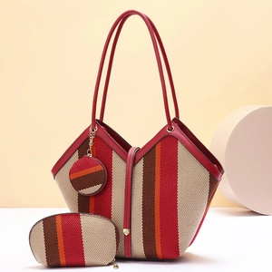 Detailed macro view of woven fabric tote bag with synthetic leather trim and color block design