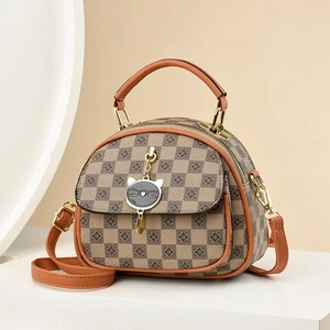 Classic checkered patterns half-moon handbag with cat charm and adjustable shoulder strap