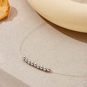 Minimalist S925 sterling silver beads necklace on transparent fishing line with sand decor
