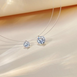 Minimalist 925 sterling silver mermaid tear necklace with floating cz pendant on fish line