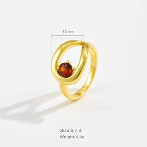 Detail view of gold hollow ring with brown gemstone showing 13mm width and size specs