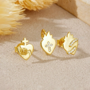 Three-piece gold-plated heart earring set with cross and rose details and micro zircons