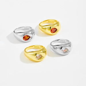 Set of four 18K gold and silver plated rings featuring pear-cut zircon teardrop stones