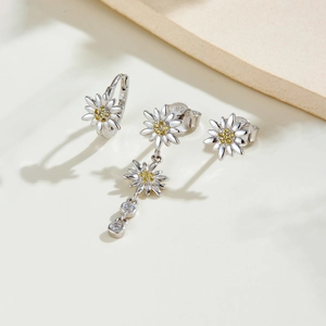 Elegant S925 sterling silver daisy earrings set with yellow stones and floral tassels