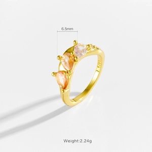 Gold S925 silver ring with three pear-cut champagne and white stones, weight 2.24g
