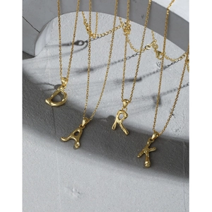 Irregular textured gold S925 sterling silver letter necklaces A-Z on geometric props
