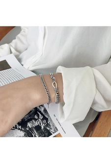 Detail of vintage S925 sterling silver curb chain bracelet set on wrist