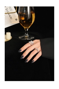 Artistic S925 silver hollow open rings with irregular lava texture shown on fingers