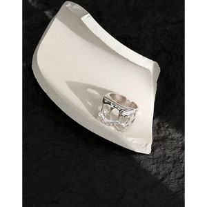 Minimalist S925 sterling silver open ring with liquid metal hollow design on dark stone