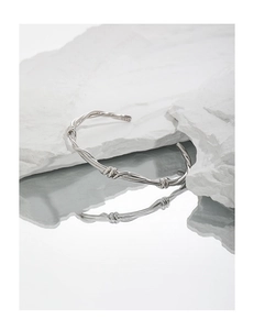 Detail of S925 sterling silver stamp on the twisted vine open bangle bracelet