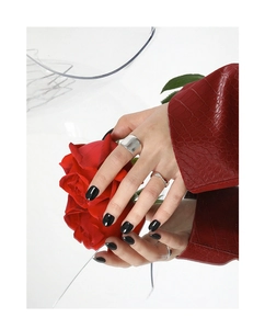 Minimalist S925 sterling silver wide band and wavy ring set on a model with a red rose